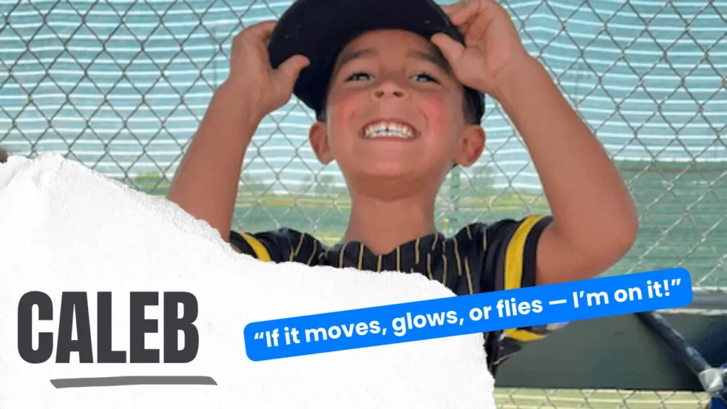 Caleb grinning with his iPad and a pile of LEGO creations, ready to show off his latest science experiment.
